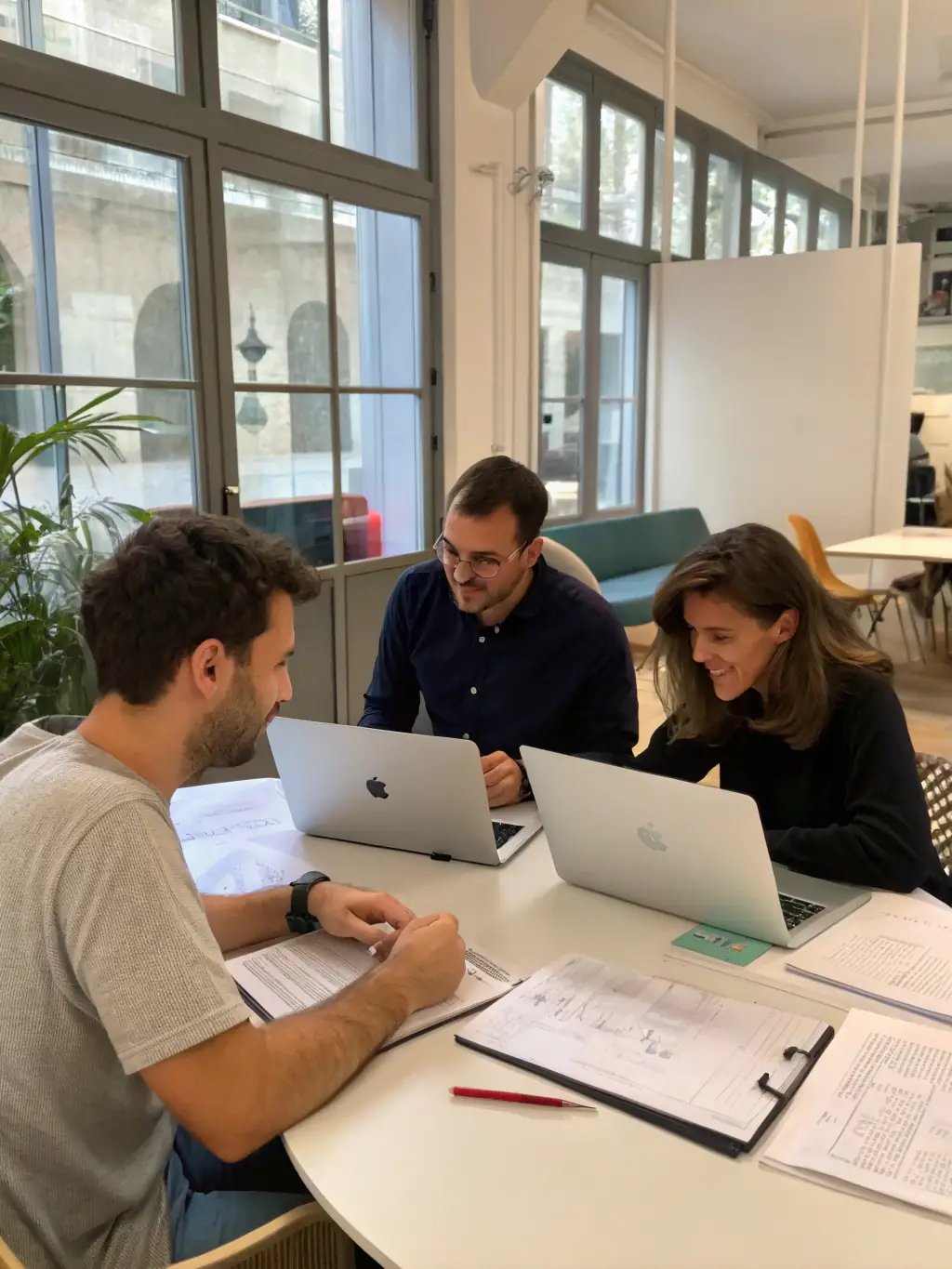 A group of startup founders participating in a BuildSpace startup challenge, receiving mentorship and feedback from experienced entrepreneurs.